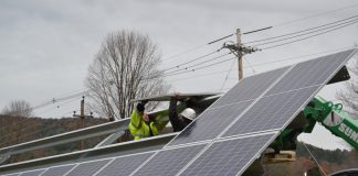Manufactured Housing Communities Powered By Solar Panels Communities powered by solar workers install panels