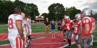Ohio Football Features UMH Properties, Manufactured Home Display coin toss midfield UMH independence bowl Ohio