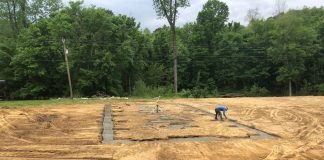 Sailing the Ship in All Weather for Kentucky Dream Homes Bozz's Excavating Brandon Boswell preparing a site