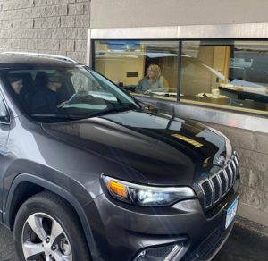 Drive-thru closing car at teller window