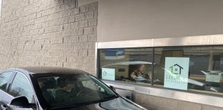Title Company Provides Drive-Thru Closing for Covid-19 Measures drive-thru closing teller window blaine minnesota