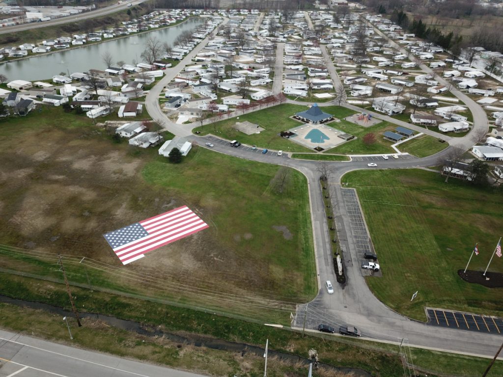 aerial shot Pikewood Manor American Flag