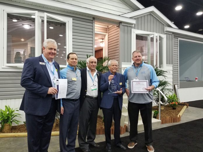 Commodore Homes receives an an award