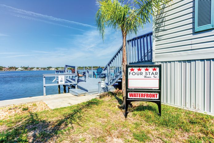 Four Star Homes waterfront sign