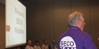 SECO21 Announces Speaker Lineup, Schedule of Events for Manufactured Housing Community Owners A presenter at SECO19 standing in front of a panel of speakers