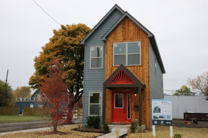 detroit housing infill project champion innovalab gilbert foundation neighborhood factory built home virbrant entry fall colors