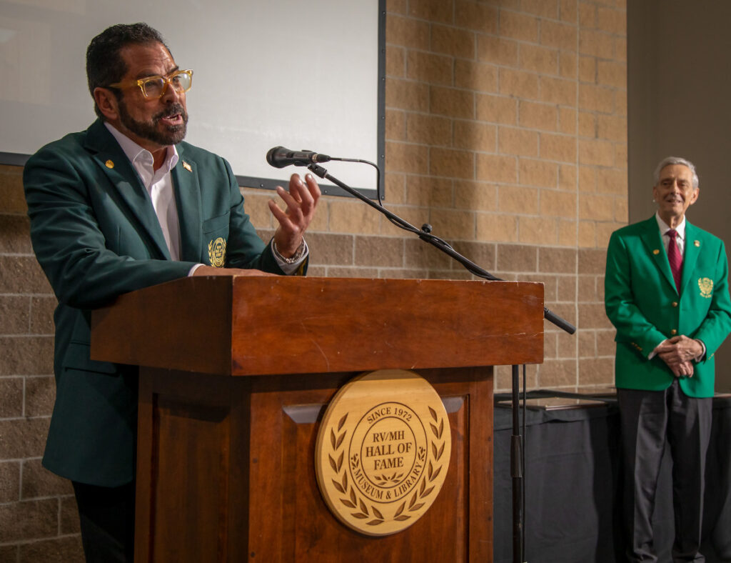 speech lectern green jacket manufactured housing hall of fame inductee steve shaub yes communities
