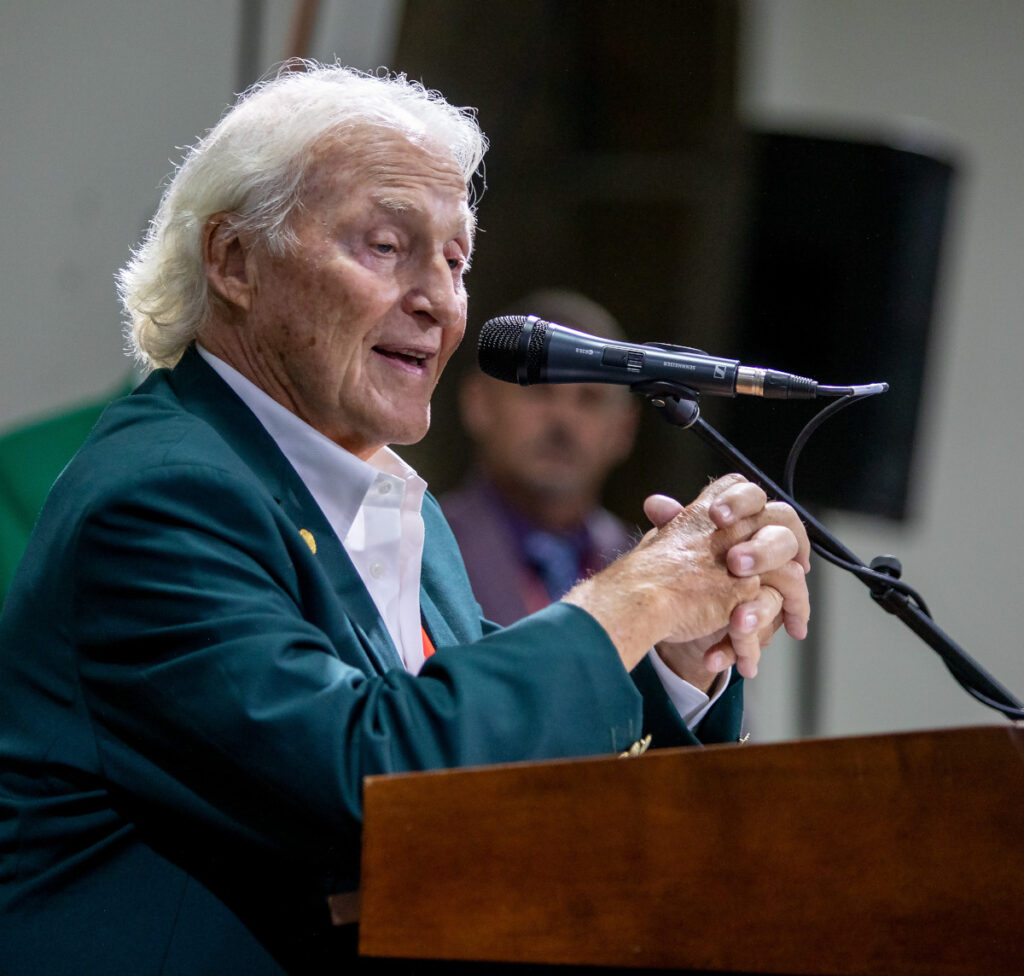 manufactured housing speech steiner inductee green jacket at microphone