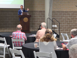 Congressman Headlines MH FacTOURy Summit northern indiana event center us rep congressman rudy yakym keynote address mh factoury summit 2025 audience listening manufactured housing