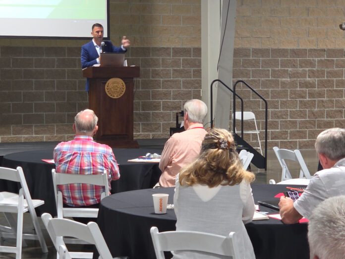 northern indiana event center us rep congressman rudy yakym keynote address mh factoury summit 2025 audience listening manufactured housing