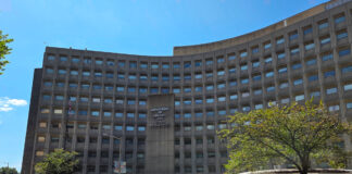 Congressmen Flood, Cleaver Introduce ‘Streamlining Manufactured Housing Standards Act’ hud headquarters building shot washington dc streetscape blue skies trees