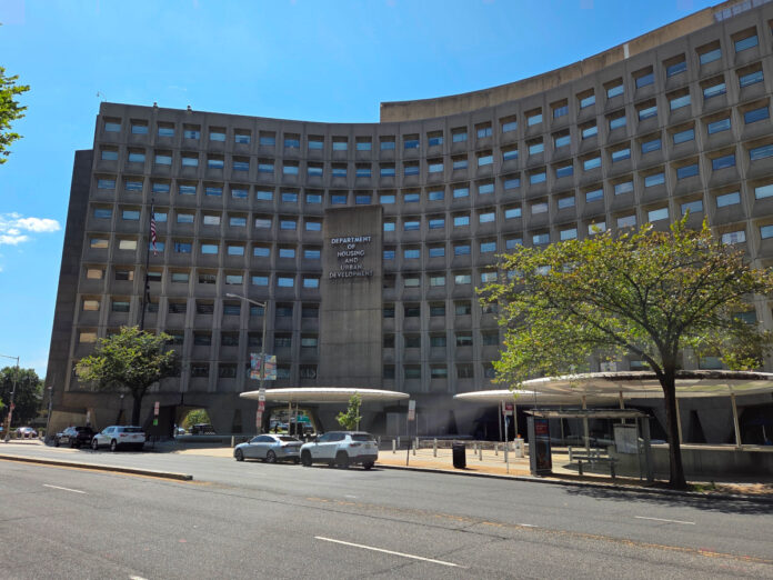 hud headquarters building shot washington dc streetscape blue skies trees