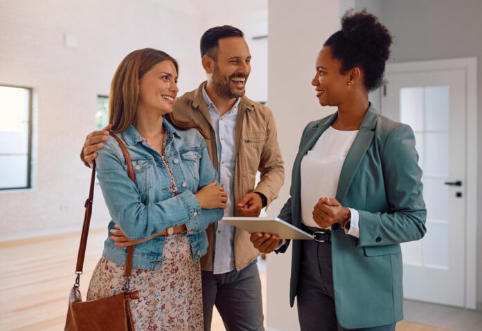 manufactured housing technology pay app couple looking at home