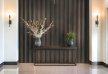 Work Smarter, Not Harder textured wall vertical accent brown woodsy lighted space plants