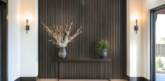 Work Smarter, Not Harder textured wall vertical accent brown woodsy lighted space plants