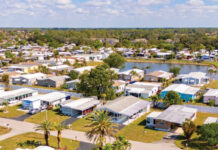 Manufactured Housing Gains Vertical Anchoring for Added Stability manufactured homes in a community setting aerial photo