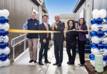Champion Teams with Developer for Fresno, Calif., Village ribbon cutting between two homes balloons officials fresno manufactured housing attainable build to rent california mhinsider mhvillage