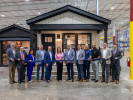 Clayton Opens First New Factory in 10 Years ribbon cutting new clayton factory arkansas governor sarah huckabee sanders