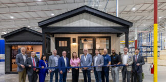 Clayton Opens First New Factory in 10 Years ribbon cutting new clayton factory arkansas governor sarah huckabee sanders