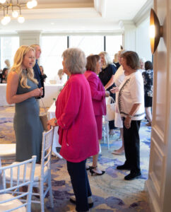 professional women talking luncheon costa mesa california june 2026