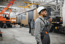 The Next Wave of Success in Factory-Built Home Retail worker man radio hardhat coveralls retail sales success john ace underwood sales strategy mhinsider magazine manufactured housing