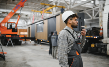 The Next Wave of Success in Factory-Built Home Retail worker man radio hardhat coveralls retail sales success john ace underwood sales strategy mhinsider magazine manufactured housing